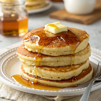 a-stack-of-golden-brown-bisquick-pancakes-with-mel (3) Fluffy Bisquick Pancakes